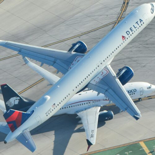 A Delta flight in the air showing how a delta flight tracker monitors long-distance routes to Japan.